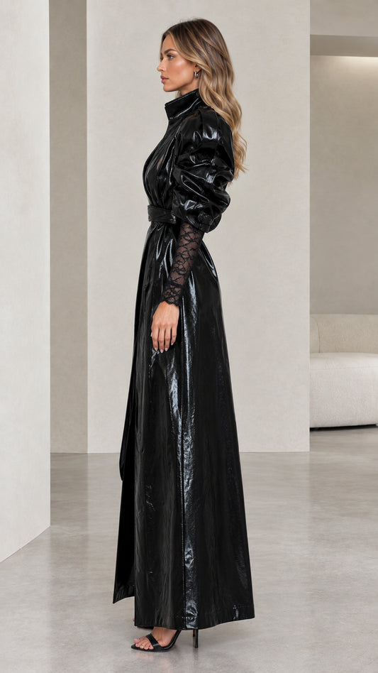 Side profile view of black glossy patent faux leather maxi coat