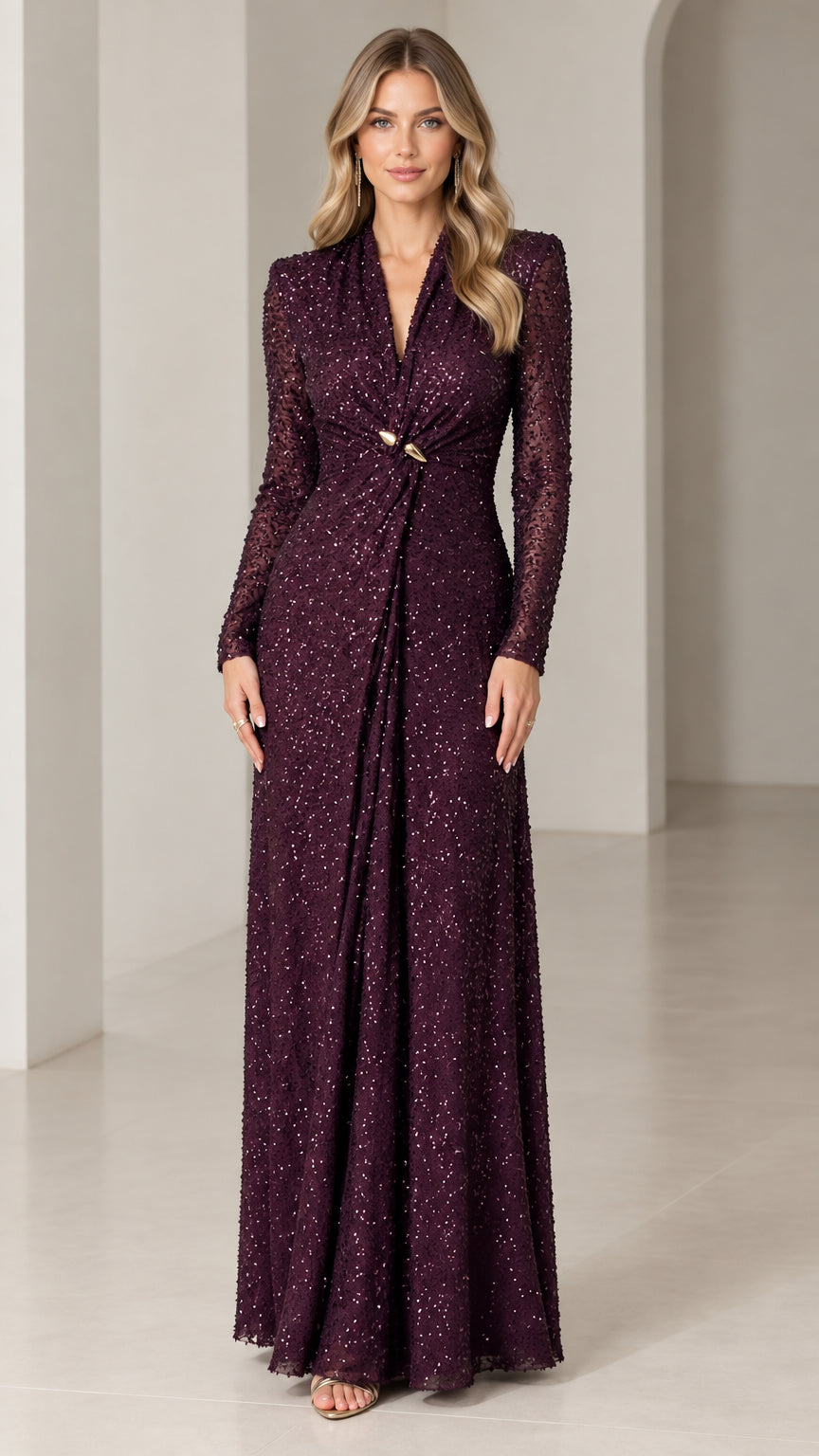 Front view of woman wearing burgundy long-sleeve sequin evening maxi gown