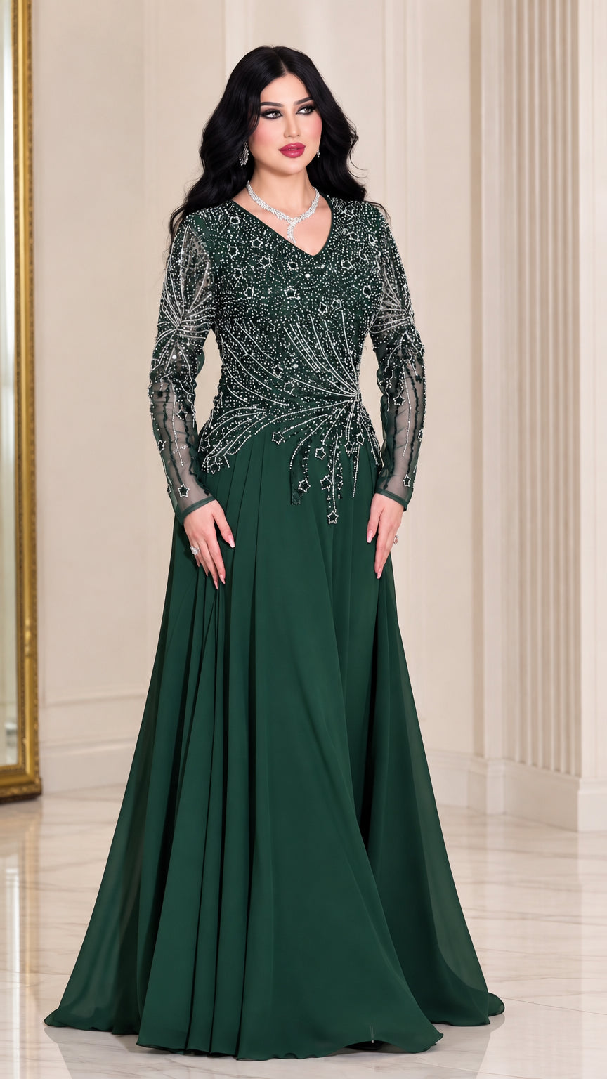 Front view of woman wearing long sleeve dark green beaded A-line evening gown