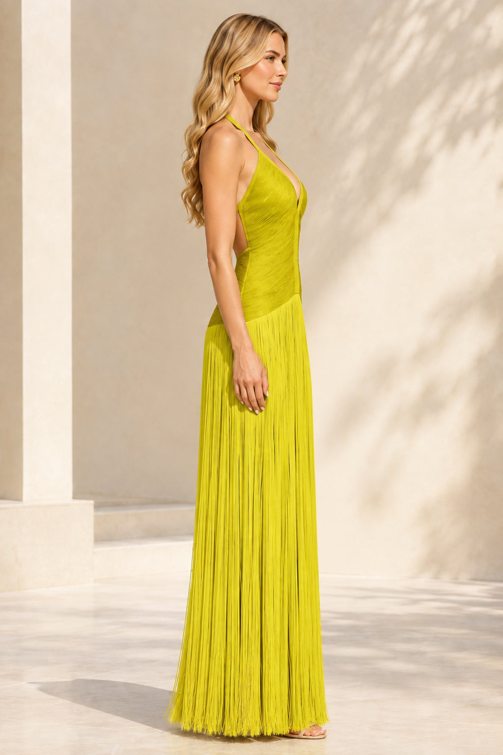 Lime green halter neck fringe maxi dress side angle view