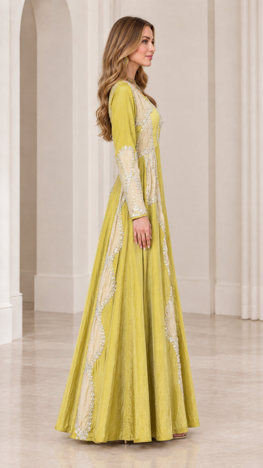 Side profile of chartreuse green floor length formal maxi gown with contrast embroidery