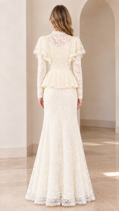 Back view of ivory lace evening dress showing sheer lace back and zip closure