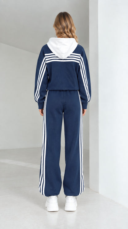 Back full view of navy blue hooded tracksuit showing contrast stripes across shoulders and down legs