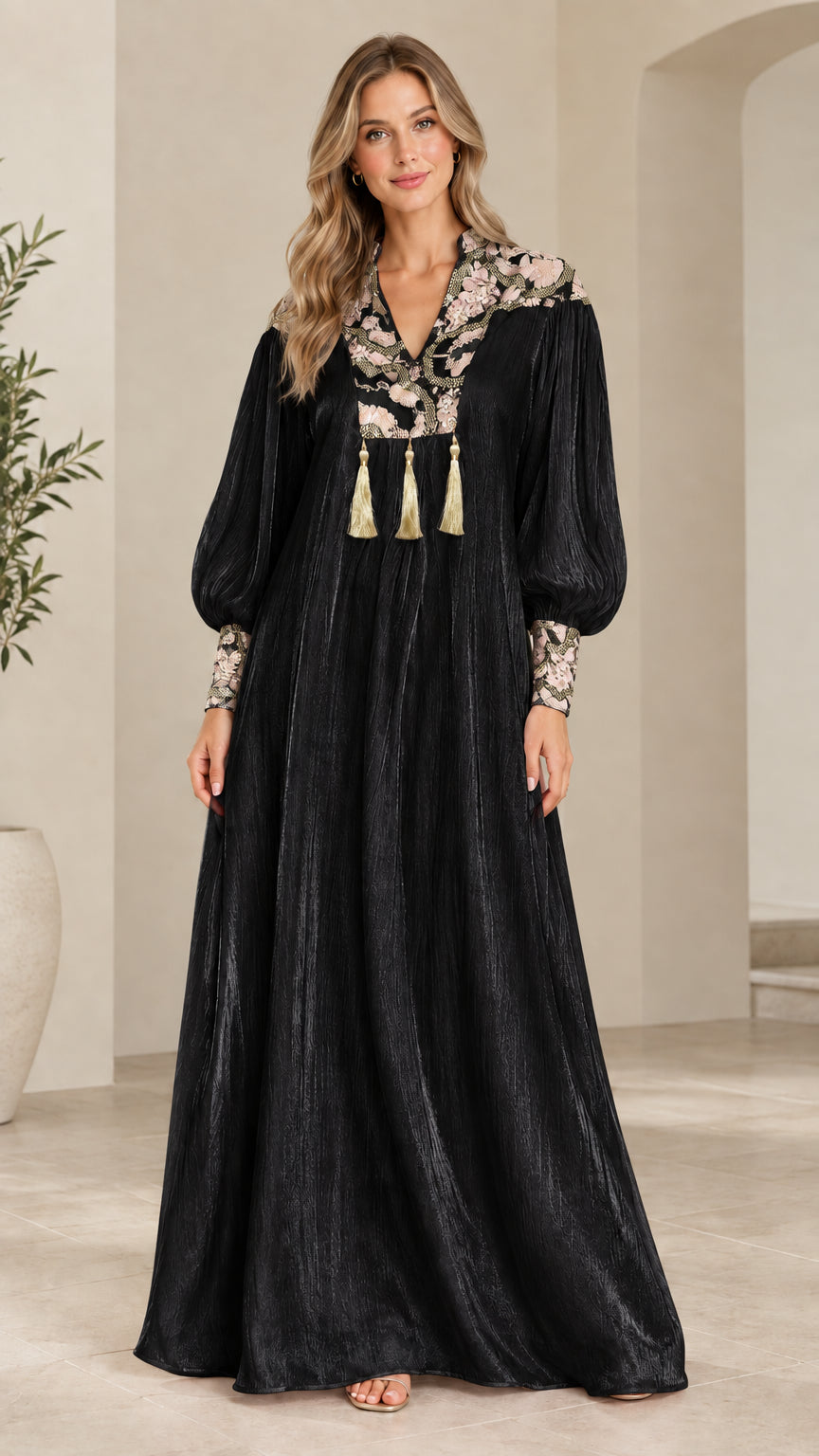 Full-length front view of model wearing Black embroidered shimmer maxi dress