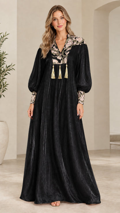 Full-length front view of model wearing Black embroidered shimmer maxi dress