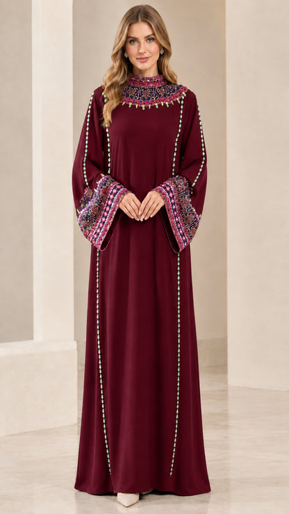 Front view of model wearing Burgundy embellished kaftan maxi dress